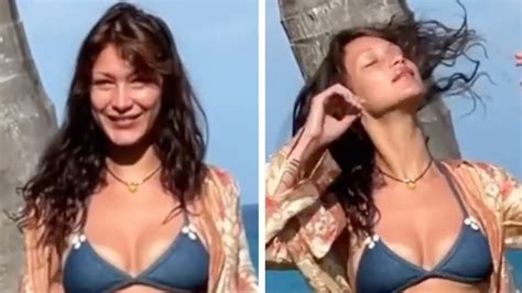 Bella Hadid Looks Incredibly Sunburnt In Tiny Blue Bikini Photos