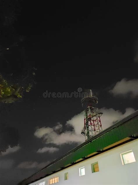 Water Tower at Night with Stars Stock Image - Image of green, yellow ...