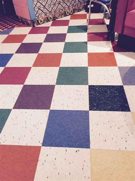 Multicolor Checkerboard Style Vct Floor With Half In White Photo Was