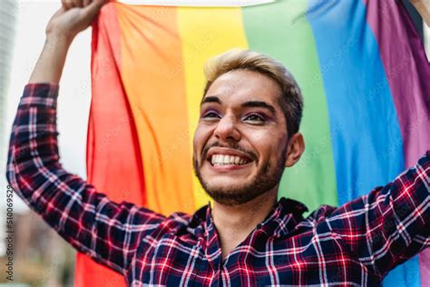 Happy Gay Man Celebrating Pride Festival Holding Rainbow Flag Symbol Of