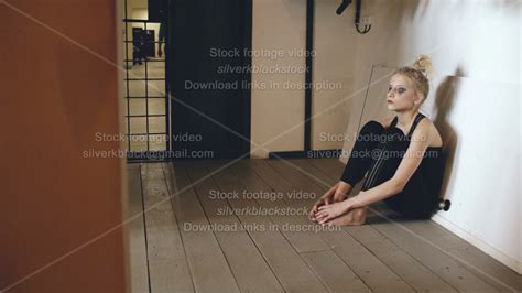 Young Teenage Girl Dancer Crying After Loss Perfomance Sits On Floor In