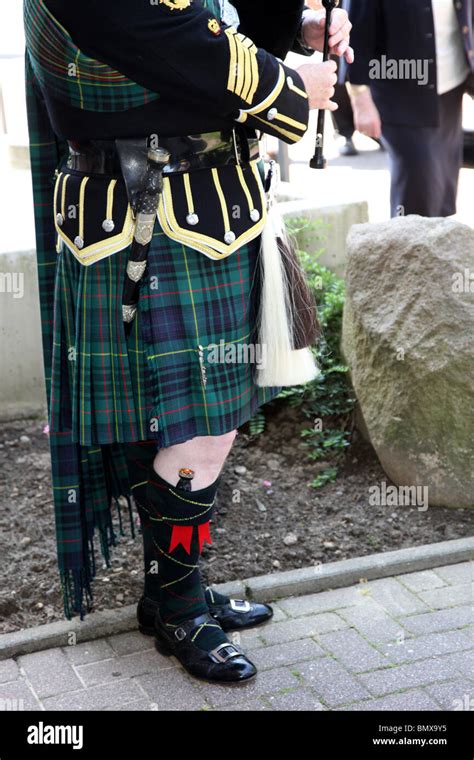 Scottish bagpipes piper with bagpipes Stock Photo - Alamy