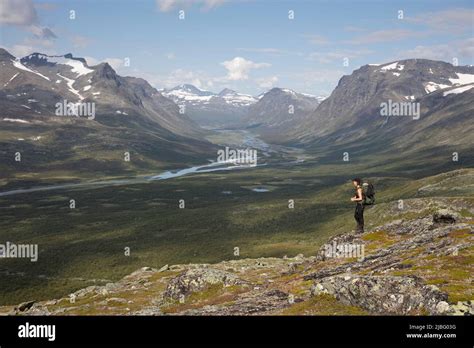 Young woman hiking in Rapa Valley in Sweden Stock Photo - Alamy