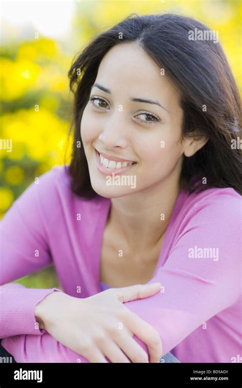 A woman outdoors smiling Stock Photo - Alamy