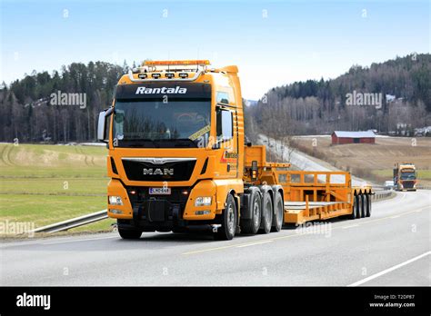 Salo, Finland - March 29, 2019: MAN TGX 41.640 truck of Rantala Yhtiot pulls Noteboom trailer on ...