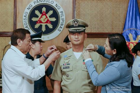 President Rodrigo Roa Duterte Pins The Rank Insignia On Newly Promoted