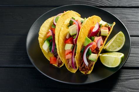 Tacos on black plate stock photo. Image of healthy, beef - 143809606