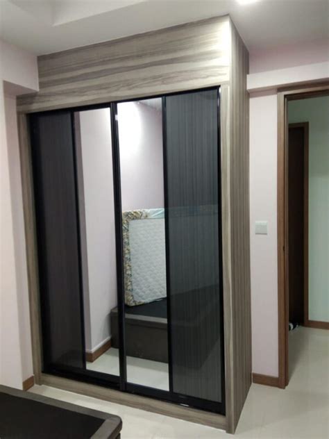 Customisable Swing Or Sliding Wardrobe Living Solution Pte Ltd