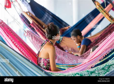 People Resting In Hammocks On Passenger Boat Deck Hi Res Stock