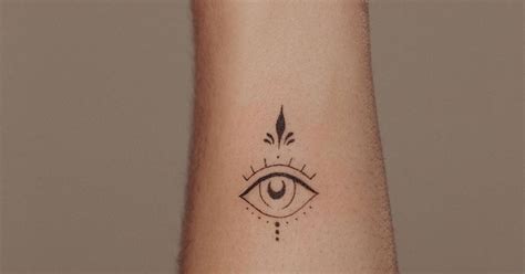 Fine Line Evil Eye Tattoo On The Wrist