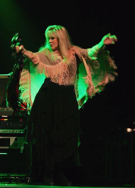 Stevie Wearing Her Now Iconic Gold Dust Woman Shawl Onstage While On