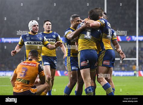 Clinton Gutherson Of The Eels Celebrates With Team Mates After Scoring