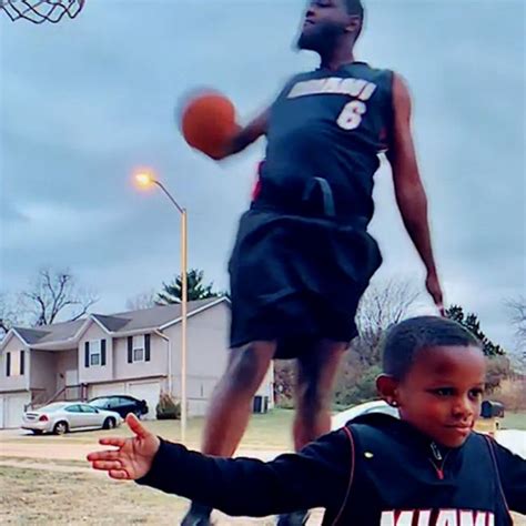 Dad and son recreate iconic LeBron James photo in their driveway - Good Morning America