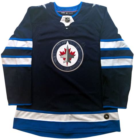 Charitybuzz: NHL Winnipeg Jets Team Signed Hockey Jersey - Lot 1509125