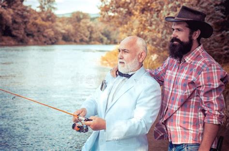 Fisherman Men Friends And Trophy Trout Father And Son Fishing