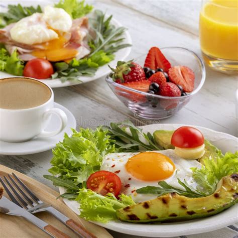 Healthy Breakfast With Fried Eggs Avocado Tomato Toasts Coffee And