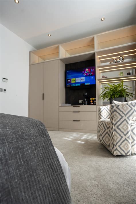 Daval Real Homes | Luxury bedroom suite with hidden walk-in wardrobe