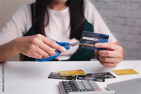 Woman Cutting Up Credit Cards Stock Foto Adobe Stock