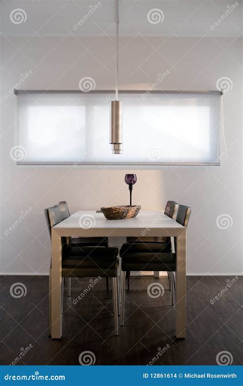 Modern dinner table stock photo. Image of flat, chairs - 12861614