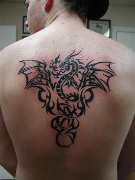 22 Beautiful Tribal Dragon Tattoo | Only Tribal