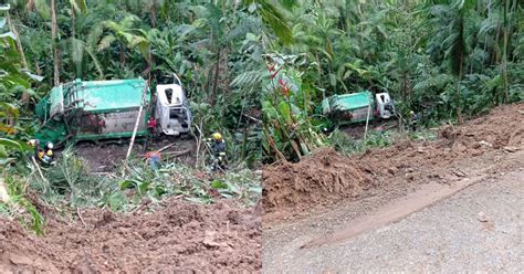 Caminhão de coleta de lixo capota e cai em ribanceira de 30 metros em