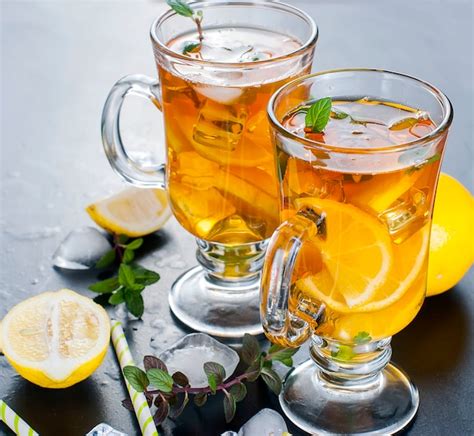 Premium Photo Cold Tea With Lemon Mint And Ice