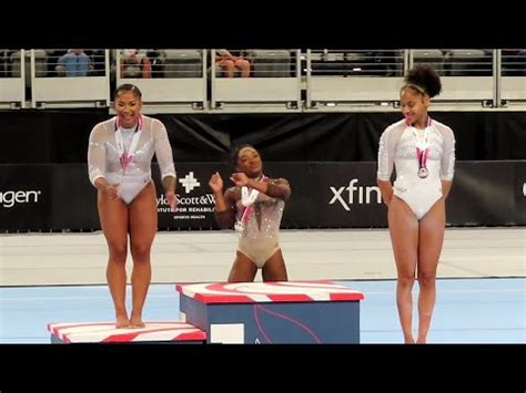 Simone Biles dances as she wins uneven bars.