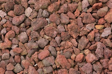 Piedra volcánica roja para jardín consejos de uso y decoración para un