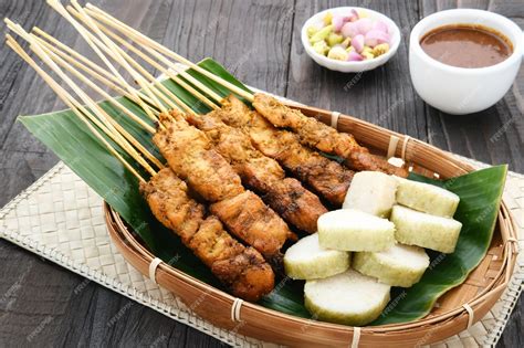 Premium Photo Chicken Satay Sate Ayam Sate Martawi With Lontong And