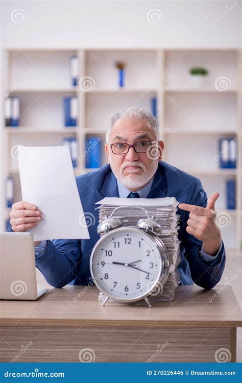 Old Male Employee In Time Management Concept Stock Photo Image Of