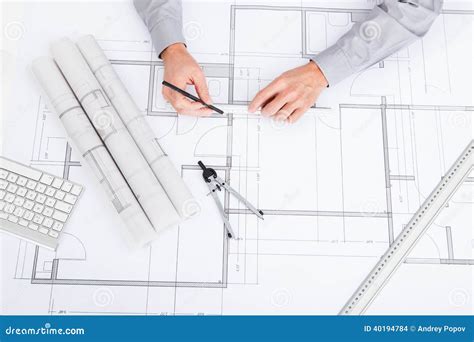 Architect Drawing On Blueprint Stock Photo - Image: 40194784