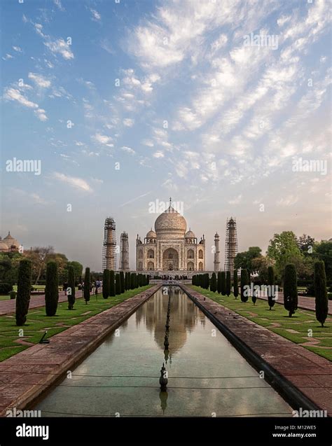 Beautiful Reflection Of Taj Mahal Early In The Morning After Sunrise