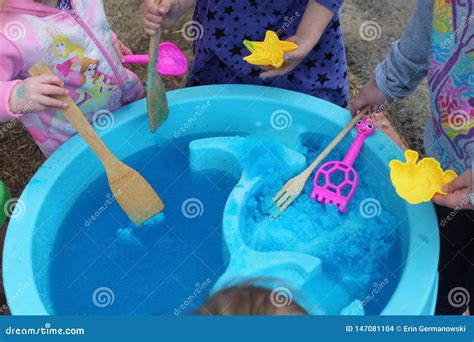 Children Exploring Bath Jelly in a Water Table Stock Photo - Image of ...