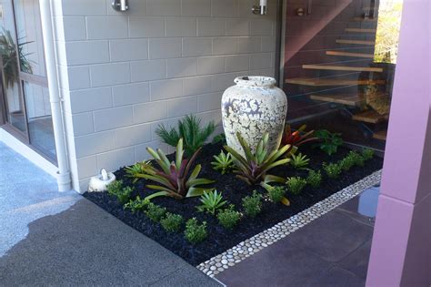 A small garden at a front entrance. Designed and implemented by Fusion ...