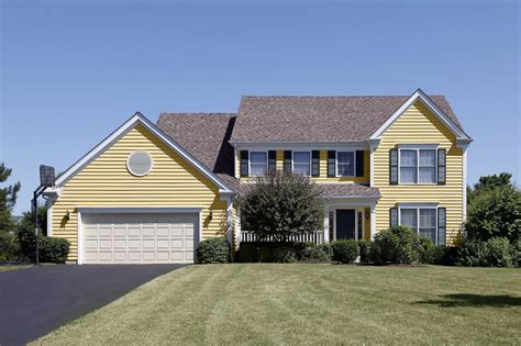 15 Best Colors to Paint House With a Brown Roof | Brown roof, Tan house ...