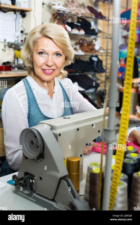 Mature Woman Tailor Using Hi Res Stock Photography And Images Alamy