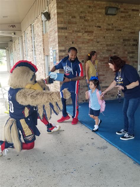 New Orleans Pelicans Distribute Prime Time Boxes of Books - Prime Time
