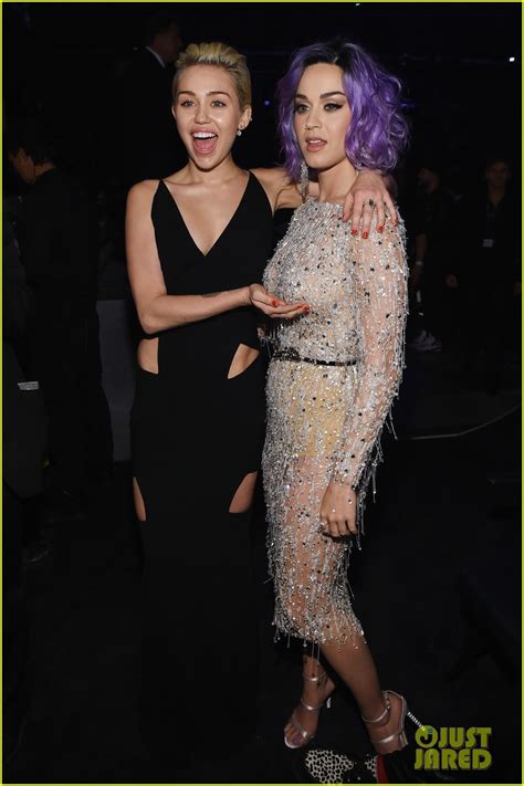 Miley Cyrus Cups Katy Perrys Boob At Grammys Photos Photo