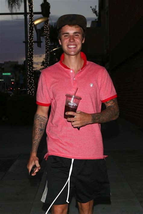 Justin Bieber Smiling Photo After Leaked Nude Pics