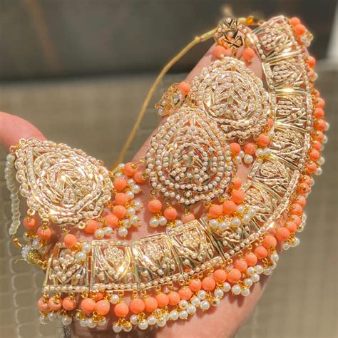 Punjabi Style Jardhu Jadau Tika Pearl Choker Set With Chandbaali Zali