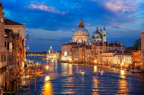 Premium Photo View Of Venice Grand Canal And Santa Maria Della Salute Church In The Evening