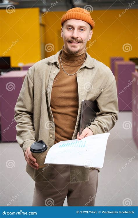 Joyous Corporate Worker Posing For Camera During Coffee Break Stock