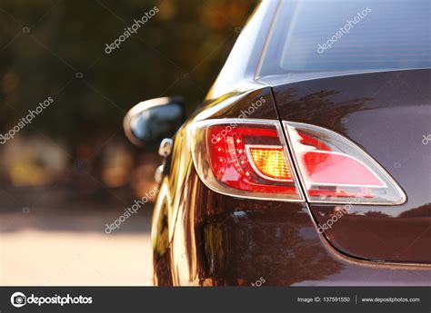 Car rear lights — Stock Photo © belchonock #137591550