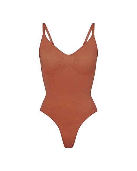 Skims Seamless Sculpt Thong Bodysuit In Brown Lyst