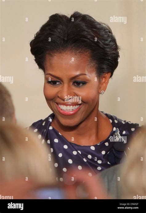 Michelle obama smiling hi-res stock photography and images - Alamy