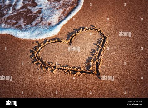 Heart Drawn On The Sand Of A Beach Stock Photo Alamy