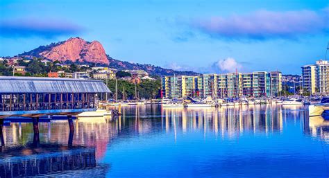 Download Townsville City Skyline At Sunrise Wallpaper | Wallpapers.com