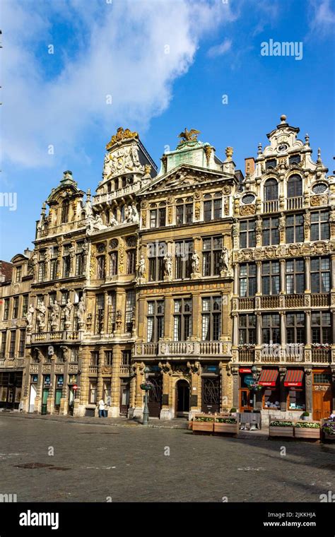 A Vertical Shot Of The Facade Of A Historical Building In Grand Place