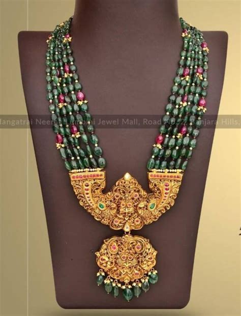 Multi Strand Emerald Beads Haram With Peacock Nakshi Pendant