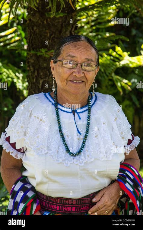 An Older Tzutujil Mayan Woman In Traditional Dress Characteristic Of